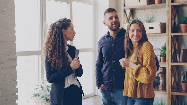 landlord talking to two tenants (3)