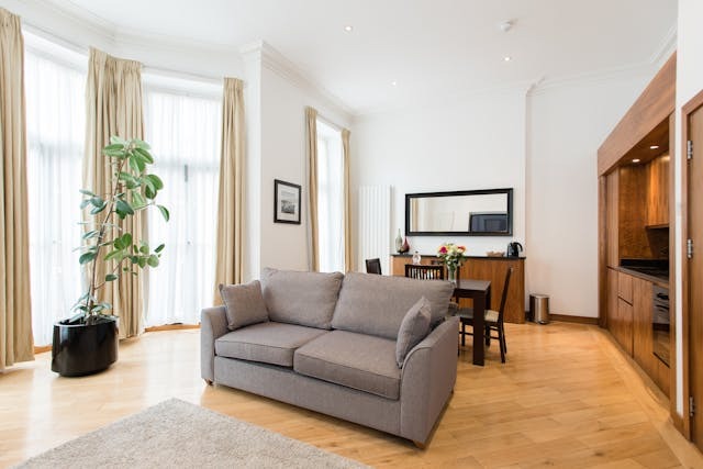 living room with grey couch